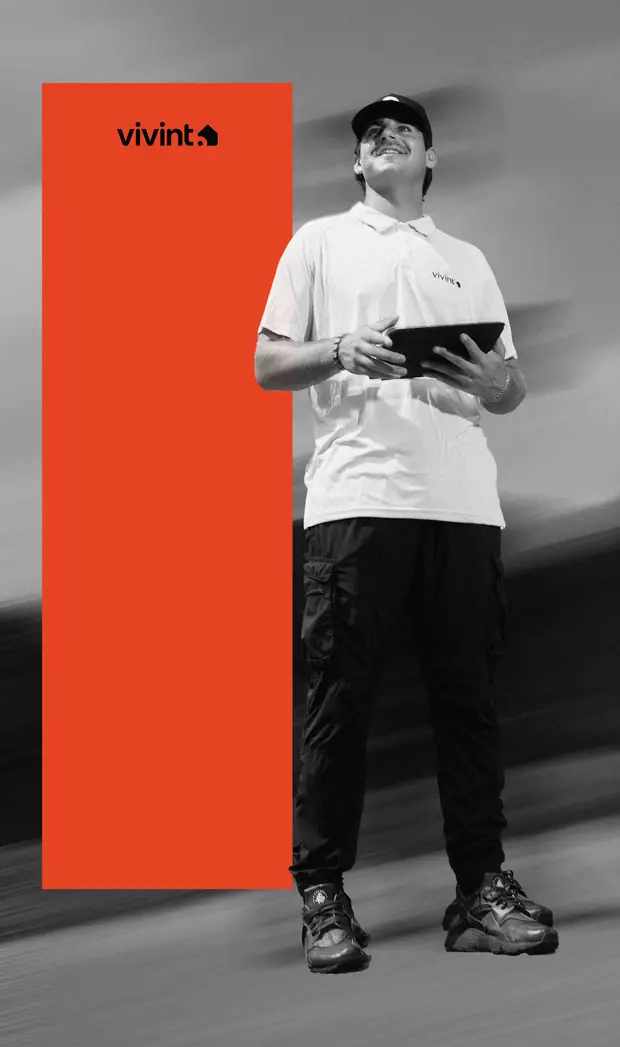 Rep with a tablet beside an orange color block